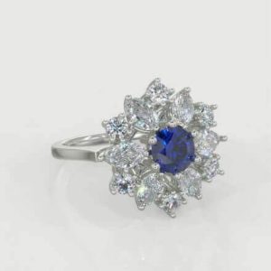 1 x 0.35ct Round Cut Sapphire 0.65ct Round Brilliant Melee Diamond Ring