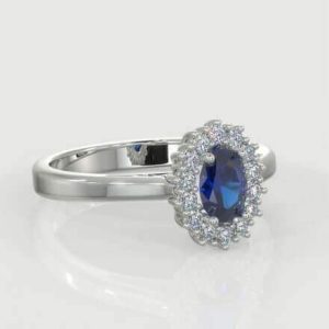 1 x 0.50ct Oval Cut Sapphire 0.25ct Round Brilliant Melee Diamond Ring