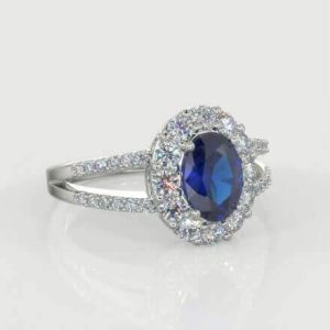 1 x 1.00ct Oval  Cut Sapphire  0.25ct Round Brilliant  Melee Diamond Ring